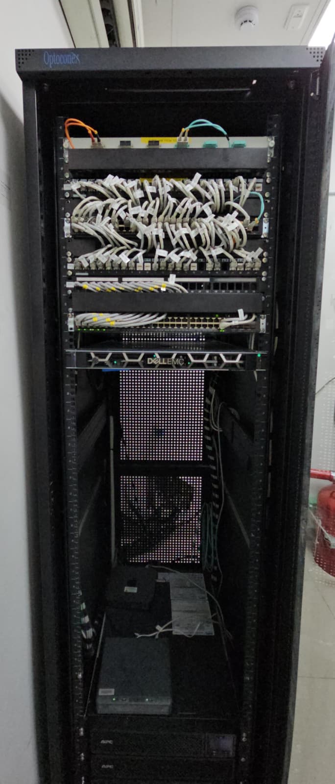 Completed network cabinet after revamp with improved cable management